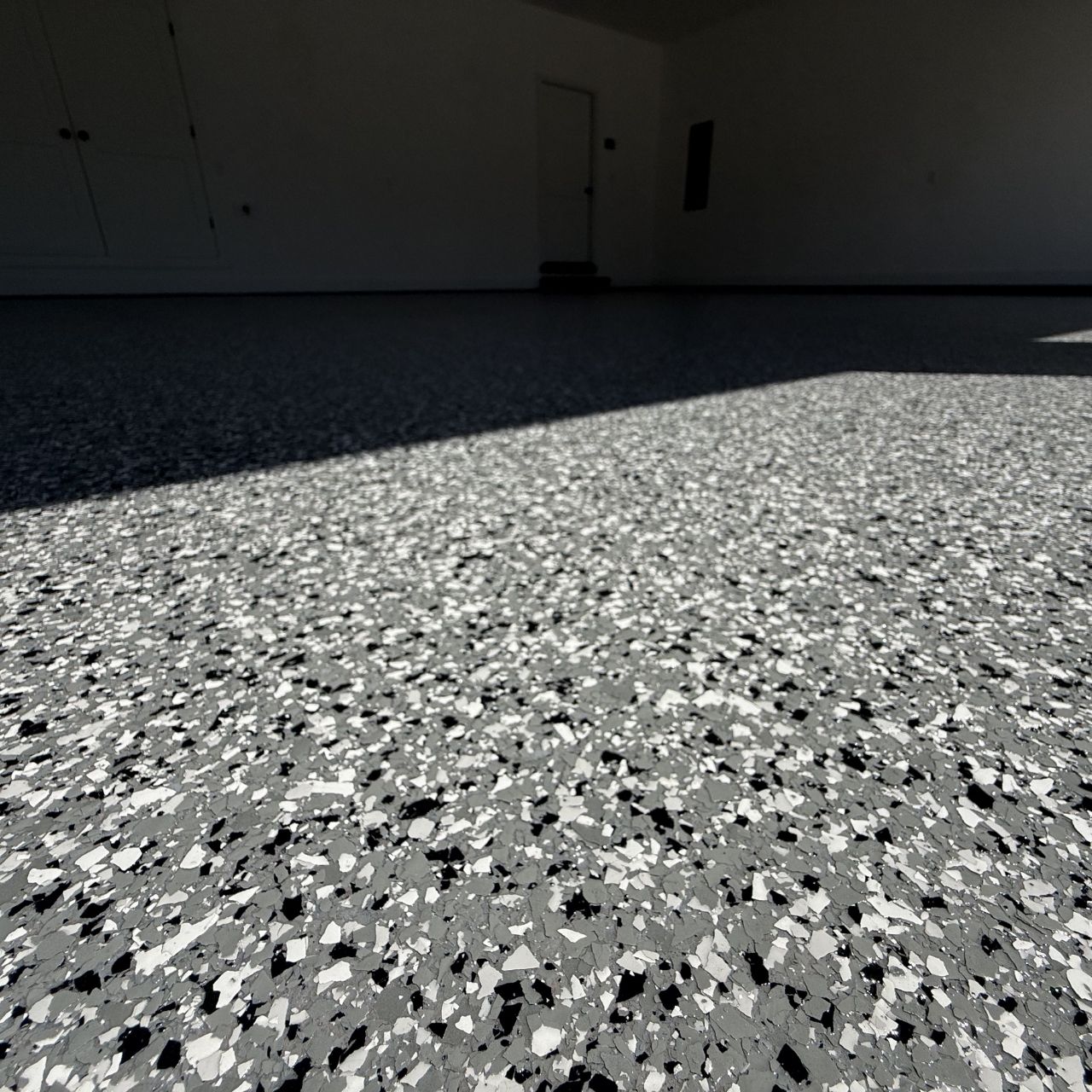 Dark charcoal flake garage floor Southwest Missouri