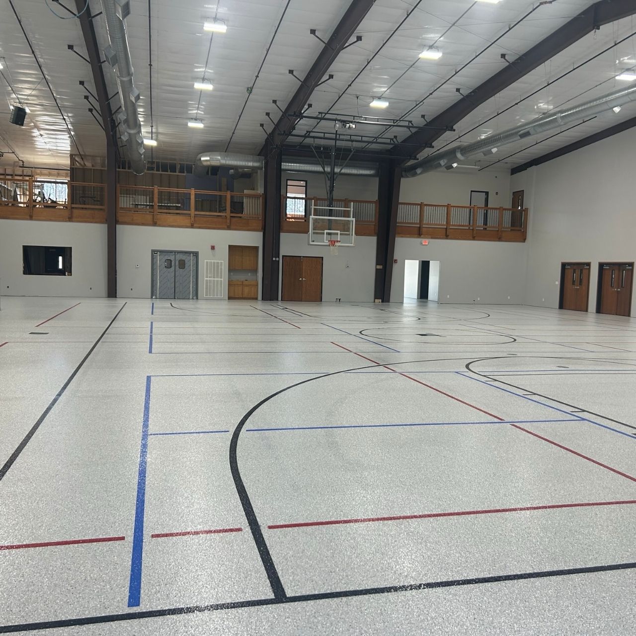 Church gym floor coating with two-tone wall Southwest Missouri