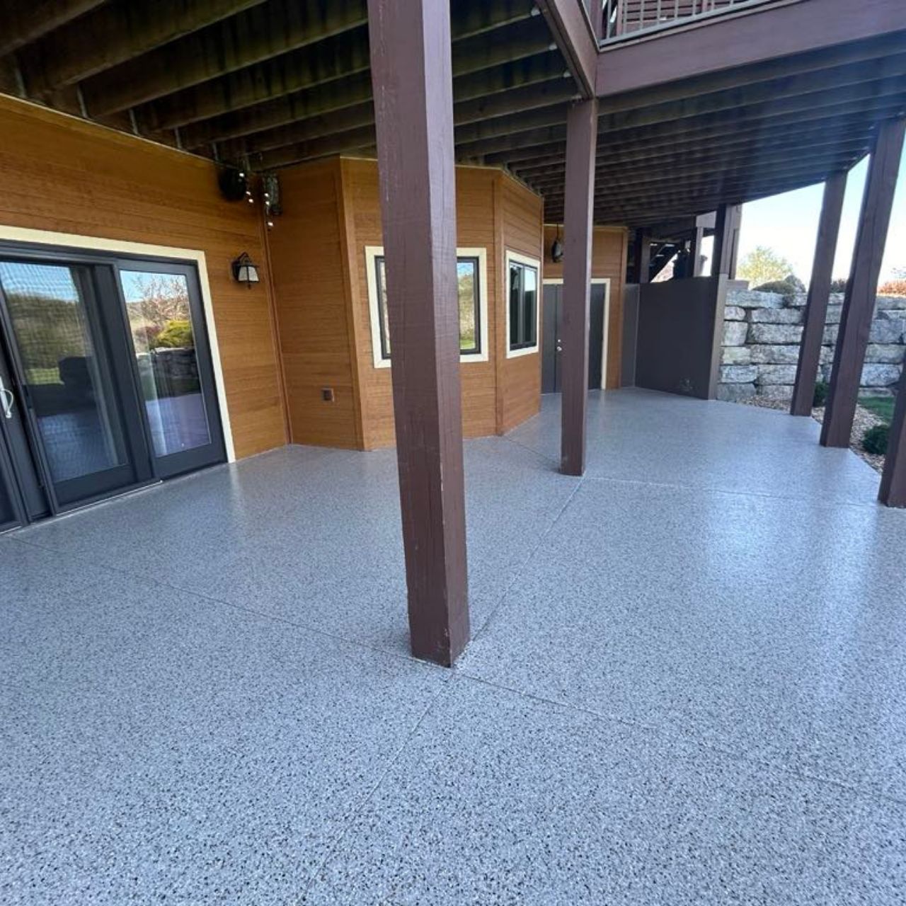 Under deck patio flake coating lake home Missouri