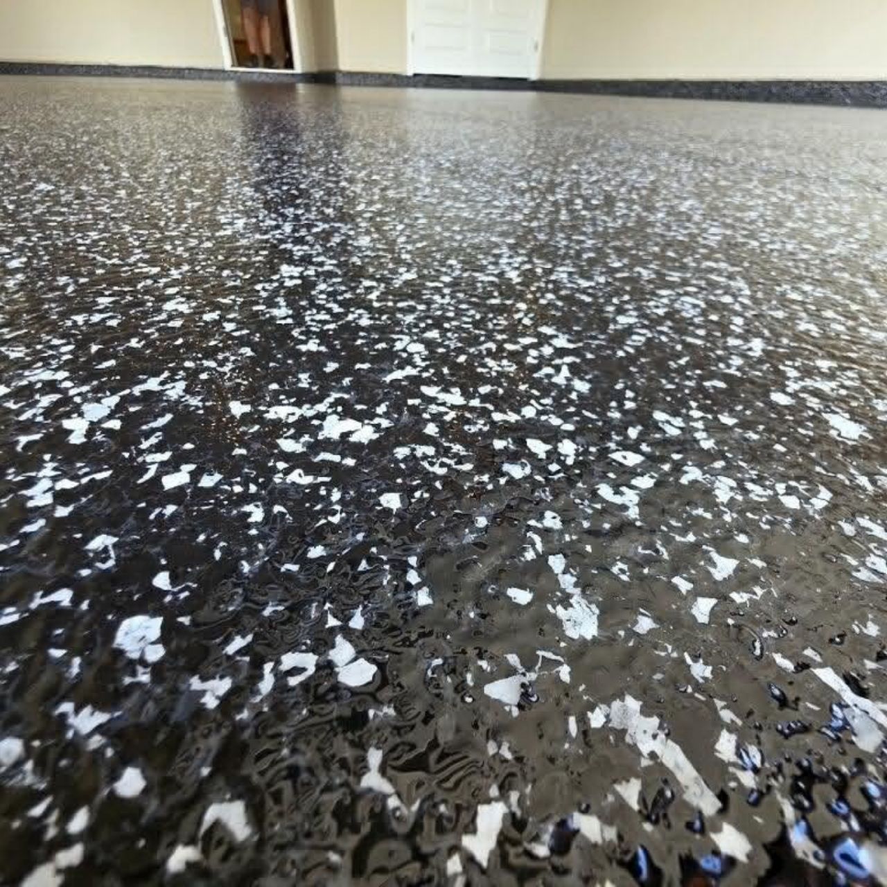 Epoxy flake broadcast installation in progress Missouri