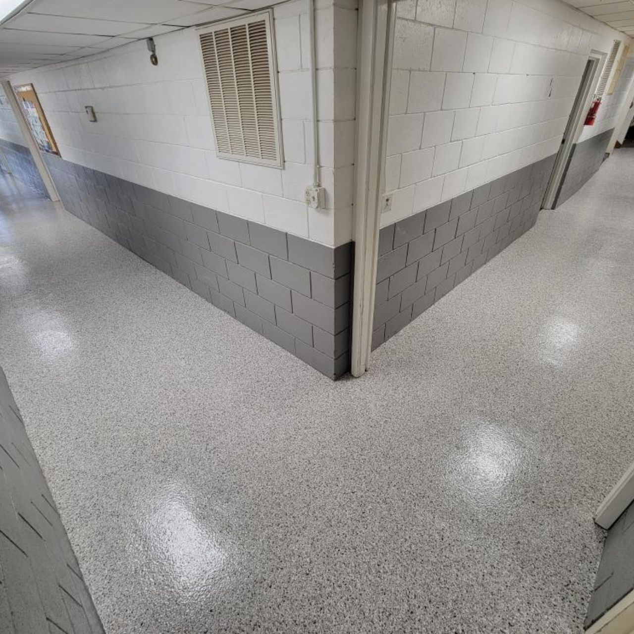 School hallway floor coating with white block walls Missouri