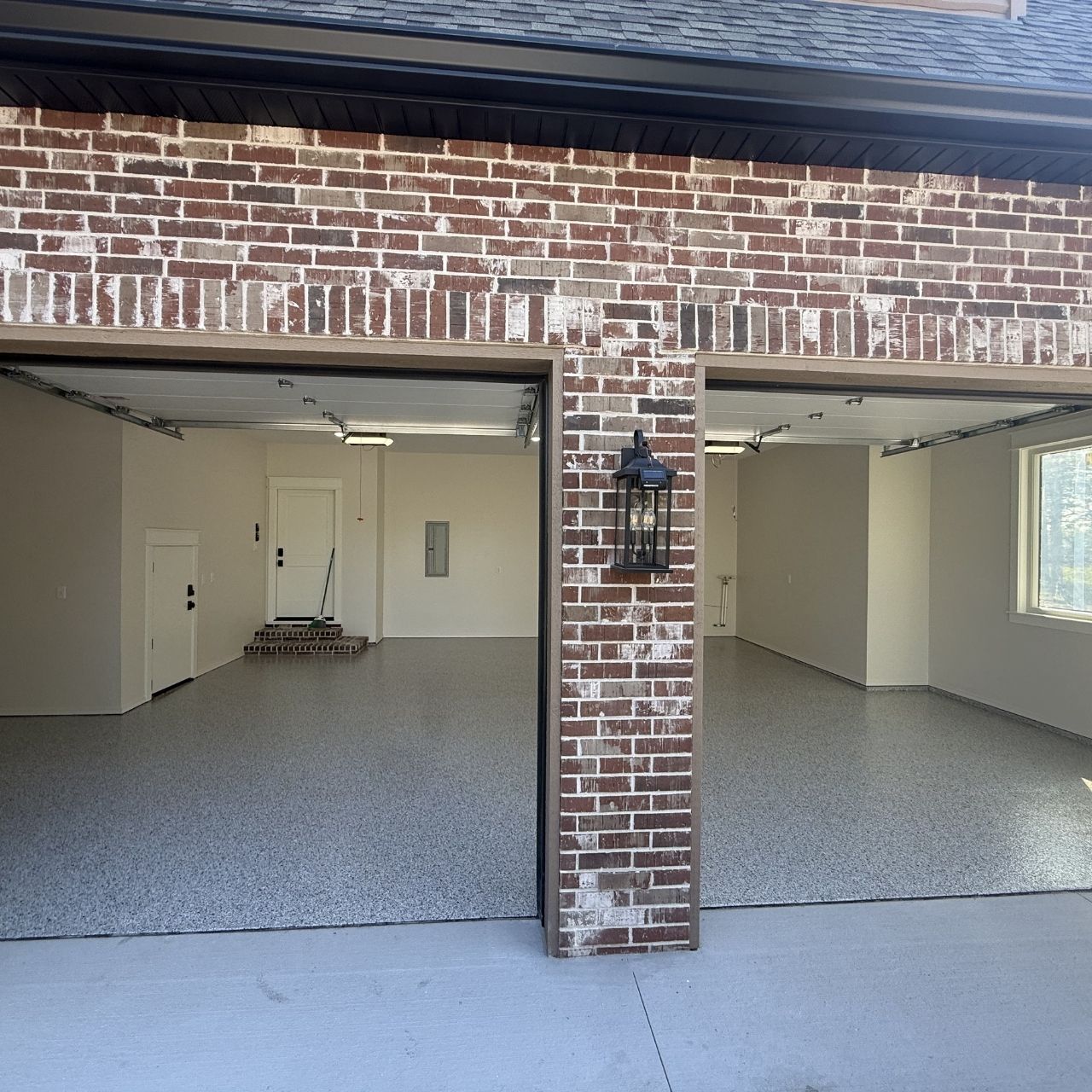 Three car garage epoxy floor coating brick home Springfield MO